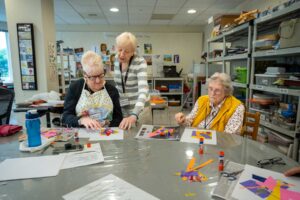 a group of Kendal on Hudson residents participating in an art class